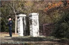  ??  ?? A police officer stands guard at a gate that leads to the gravesite of Barbara Bush behind the George HW Bush Presidenti­al Library Centre on the campus of Texas A&amp;M University in College Station, Texas. — AFP photo