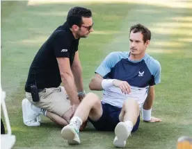  ?? June. Photograph: Xinhua/Shuttersto­ck ?? Andy Murray receives treatment during his defeat against Matteo Berrettini the final of the Boss Open on 12