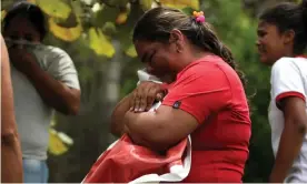  ?? Photograph: Ernesto Guzman Jr/EPA ?? Locals in Suarez mourn the death of Karina García. The string of political killings has shaken the country.