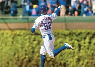  ?? BRIAN CASSELLA/CHICAGO TRIBUNE ?? Pete Crow-Armstrong salutes the crowd while rounding the bases after hitting a two-run home run in the sixth inning against the Astros on Thursday.