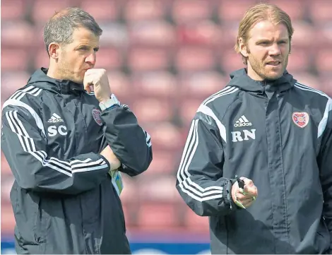  ?? Picture: SNS. ?? Dunfermlin­e boss Stevie Crawford, left, worked with Robbie Neilson in the latter’s first spell at Hearts.