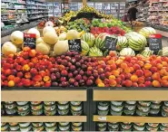  ?? ASSOCIATED PRESS FILE PHOTO ?? Fruit is on sale in June at a grocery store in Aventura, Fla. Despite a low unemployme­nt rate, many Americans were unable to meet basic needs last year, including many who suffered food insecurity.