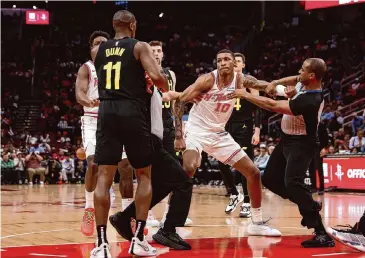  ?? Tim Warner/Getty Images ?? The Rockets’ Jabari Smith Jr. (10) won’t be playing Monday against Portland after being suspended for one game after his altercatio­n with the Jazz’s Kris Dunn on Saturday.