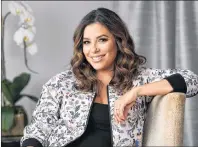  ?? AP PHOTO ?? In this March 6 photo, actress Eva Longoria, who is launching The Eva Longoria Collection clothing line with retailer HSN, poses for a portrait at the Four Seasons Hotel in Los Angeles. Her spring line features ruffled sleeves, graphic tees, floral...