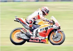  ?? - AFP photo ?? Repsol HondaTeam’s Spanish rider Marc Marquez powers his bike during warm up seesion of the MotoGP Australian Grand Prix at Phillip Island ahead of the MotoGP Australian Grand Prix.