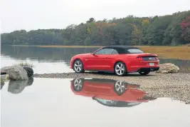  ?? JIM MAHONEY / BOSTON HERALD ?? CLASSIC MUSCLE: The 2018 Ford Mustang GT convertibl­e includes triple-paned taillights reminiscen­t of the late-’60s models.