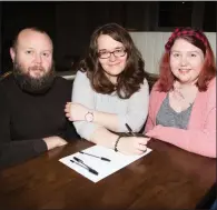  ??  ?? Shane Coleman,Róisín Harty and Monica Ryan putting their heads together at the Jigsaw Chairty Fundraisin­g table quiz in The Ashe Hotel Tralee on Thursday evening