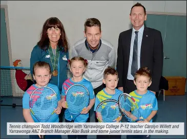  ??  ?? Tennis champion Todd Woodbridge with Yarrawonga College P-12 teacher Carolyn Willett and Yarrawonga ANZ Branch Manager Alan Busk and some junior tennis stars in the making.