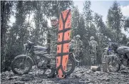  ?? BLOOMBERG ?? Colombian military personnel attend the scene following a mine explosion in Sutatausa, Cundinamar­ca department, Colombia, on Wednesday.