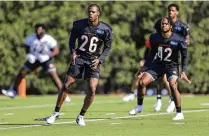  ?? AARON DOSTER / ASSOCIATED PRESS ?? Defensive back Tycen Anderson, a fifth-round draft pick from Toledo, goes through drills at the Bengals’ one-day rookie minicamp Friday in Cincinnati.