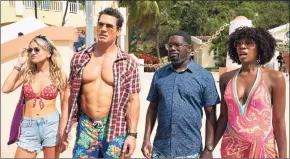 ?? Jessica Miglio / Associated Press ?? From left, Meredith Hagner, John Cena, Lil Rel Howery and Yvonne Orji in a scene from “Vacation Friends.”