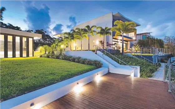  ??  ?? This luxury home in Edgecliff Drive, Sanctuary Cove is due to go under the hammer today. It’s an auction that will be keenly watched from India.
