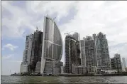  ?? ARNULFO FRANCO / ASSOCIATED PRESS 2011 ?? The Trump Internatio­nal Hotel Panama in Panama City is the third building from left. Panama’s government is investigat­ing a complaint that hotel business executives are refusing to leave.