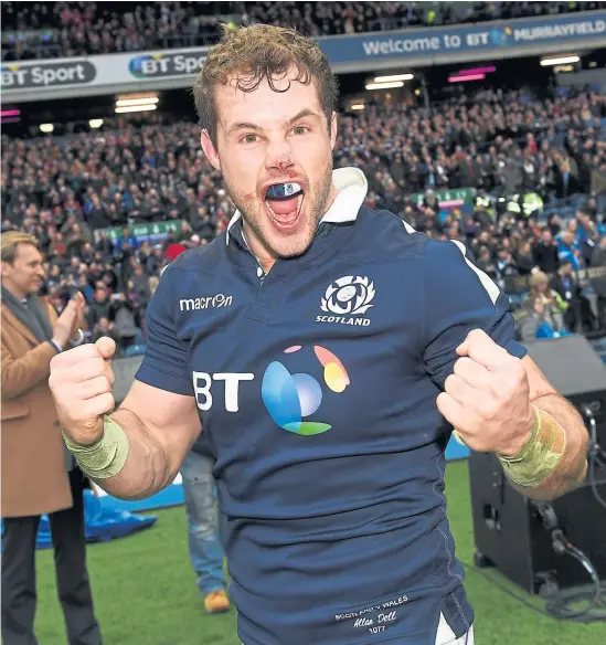  ?? Photograph: SNS ?? A delighted Allan Dell celebrates Scotland’s remarkable victory over the Welsh at Murrayfiel­d