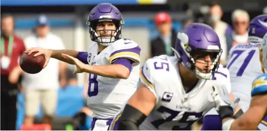  ?? GETTY IMAGES ?? Vikings quarterbac­k Kirk Cousins has the best intercepti­on percentage (0.6) in the league, but coach Mike Zimmer says he needs to be more aggressive.