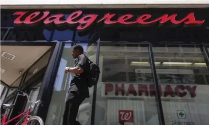  ?? Photograph: John Minchillo/AP ?? Walgreens Boots Alliance, which owns Walgreens and Duane Reade in the US, Boots in the UK, operates in 25 countries and has over 415,000 employees.