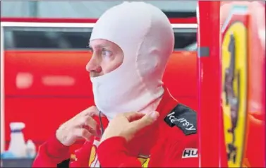  ??  ?? Sebastian Vettel se prepara para subirse al Ferrari durante el pasado GP de Austria, en Red Bull Ring.
