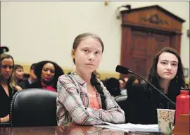 ?? Alex Wong Getty Images ?? SWEDISH ACTIVIST Greta Thunberg, 16, appears this week at a congressio­nal hearing in Washington, imploring lawmakers to heed scientists’ climate warnings.