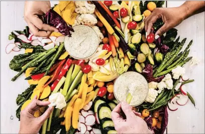  ?? ZBIGNIEW BZDAK/CHICAGO TRIBUNE; MARK GRAHAM/FOOD STYLING ?? A platter of crudite can win the day if you skip the supermarke­t offerings and make your own. Serve with a vegan ranch-style dressing.