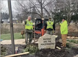  ?? SUBMITTED ?? The Richmond Heights Service Department did the heavy lifting of installing the rock outside the police station on Jan. 11.