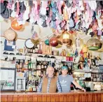  ??  ?? HANG ‘EM HIGH: Inside the notorious Panty Bar at The Paternoste­r Hotel.