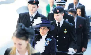  ??  ?? ●●The new High Sheriff of Greater Manchester Dr Robina Shah arrives at the ceremony with other guests