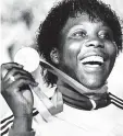  ?? ?? Tears turned to cheers for Tessa Sanderson after winning gold in Los Angeles in 1984