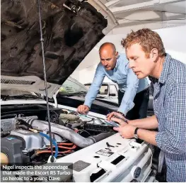  ??  ?? Nigel inspects the appendage that made the Escort RS Turbo so heroic to a young Dave