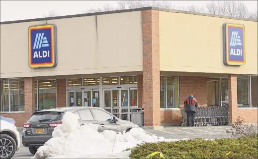  ?? Lori Van Buren / Times Union ?? The ALDI supermarke­t in Rensselaer is seen on Wednesday. ALDI recently partnered with Instacart to allow SNAP recipients to be able to get groceries delivered. There will be no delivery charge for a limited time.