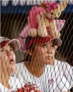  ?? STAN GROSSFELD/GLOBE STAFF ?? The Stanford softball team had pompoms and stuffed animals to keep up the spirit.