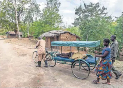  ?? Photos: Amos Gumulira ?? Making do: Bicycles are used as ambulances in rural areas where people struggle get to clinics or hospitals because the facilities are too far away or patients are too weak to walk.