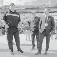  ?? PHELAN M. EBENHACK/AP ?? Decisions, decisions: Jaguars coach Doug Marrone, from left, executive vice president of football operations Tom Coughlin and general manager David Caldwell face major changes in Jacksonvil­le after this season’s disappoint­ing campaign.