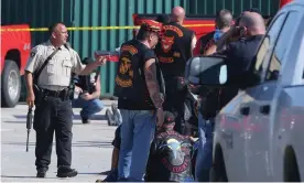  ??  ?? A gunfight between members of rival biker gangs in the parking lot of the Twin Peaks restaurant in Waco, Texas, on 17 May 2015 left nine dead. Photograph: Jerry Larson/AP