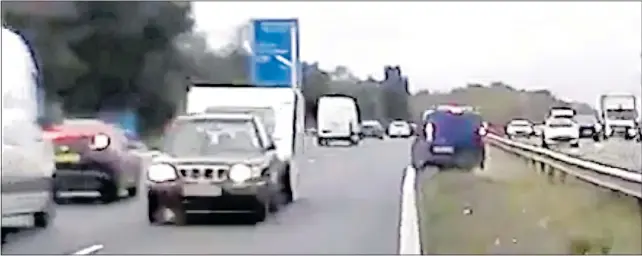  ??  ?? CHAOS: Dashcam footage of the Subaru and caravan going the wrong way and a van swerving into the central reservatio­n moments before the collision