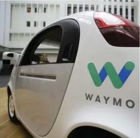  ?? ERIC RISBERG/THE ASSOCIATED PRESS FILE PHOTO ?? Lyft and Waymo, of Google parent company Alphabet, are joining forces to test driverless car technology. Both companies face a foe in Uber in the ride-sharing and autonomous-vehicle arenas.