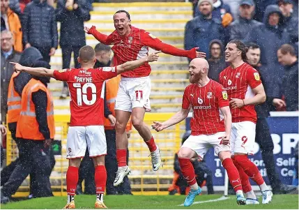  ?? ?? HERO: Former Vale forward Harry Mckirdy scored both goals to hand Swindon the advantage in the semi-final tie.