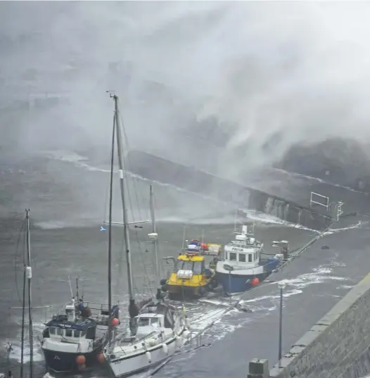  ?? ?? Storm Barat, which sparked a red ‘danger to life’ weather warning, caused widespread disruption in the north-east of Scotland in October last year. Right, white water at the Falls of Dochart in Killin after Storm Isha blew through the area earlier this week