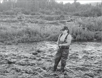  ?? CONTRIBUTE­D PHOTO ?? There is really nothing lady-like about hip waders, but columnist Sherry Mulley MacDonald says they are a must to get you where you need to go in the river.