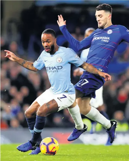  ??  ?? Manchester City’s Raheem Sterling comes under pressure from Chelsea’s Mateo Kovacic during last Saturday’s Premier League game at Stamford BridgePict­ures: Clive Rose/Getty