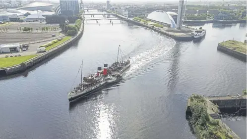  ?? PICTURE: JOHN DEVLIN/THE SCOTSMAN ?? Waverley leaving its berth beside Glasgow Science Centre at the launch of its summer season last May for a cruise down the Clyde to Tighnabrua­ich