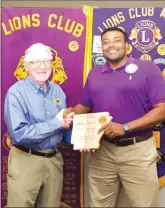  ?? MATT JOHNSON/CONTRIBUTI­NG PHOTOGRAPH­ER ?? Searcy Lions Club secretary Bob Simpson, left, poses with Henry North, who was named Lion of the Year. North said the award is an outstandin­g honor.