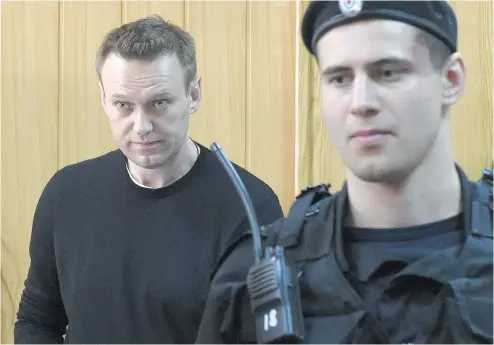  ?? VASILY MAXIMOV / AFP / GETTY IMAGES ?? Russian opposition leader Alexei Navalny was sentenced to 15 days in jail after he and more than 1,000 other demonstrat­ors were detained at a protest in Moscow that was branded a “provocatio­n” by the Kremlin.