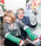  ??  ?? We’re game Panto favourites The Krankies have some jazzy festive socks