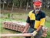  ??  ?? Denis Hocking mills eucalyptus logs at his farm near Bulls in Rangitikei.