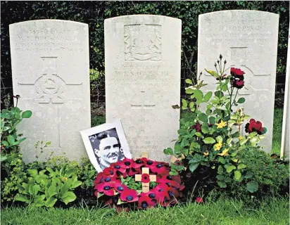  ??  ?? Resting place: Sir Andrew, below, visited Wilfred Owen’s grave in northern France