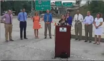  ?? BRIAN MCCULLOUGH - DIGITAL FIRST MEDIA ?? Officials gather in August to mark the opening of a stretch of Route 202 in East Whiteland.