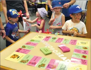  ?? SUBMITTED PHOTO ?? Local children enjoy the Monoporead board at the official launch on July 3.