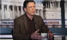  ?? Photograph: Kevin Wolf/ ?? James Comey talks with Fox News Sunday anchor Chris Wallace.