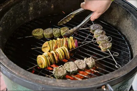  ?? MIA YAKEL/FILE ?? New grilling recipes promise to enhance your summer eating and all year round, if you keep on grillin’.