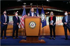  ?? (AP/Amanda Andrade-Rhoades) ?? Rep. Hakeem Jeffries of New York is joined by fellow Democratic House members at a news conference Tuesday on the $3.5 trillion budget blueprint passed by the House. The action sets in motion efforts to forge a fuller plan.